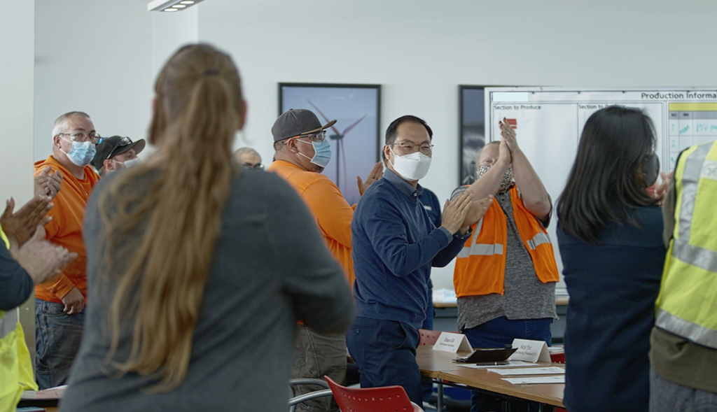 A Case Study on Eliminating Meeting Wastes in Global Production Plants